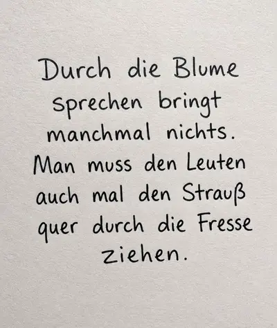 Ein handgeschriebener Spruch auf weißem Papier über die Notwendigkeit von direkter Kommunikation.